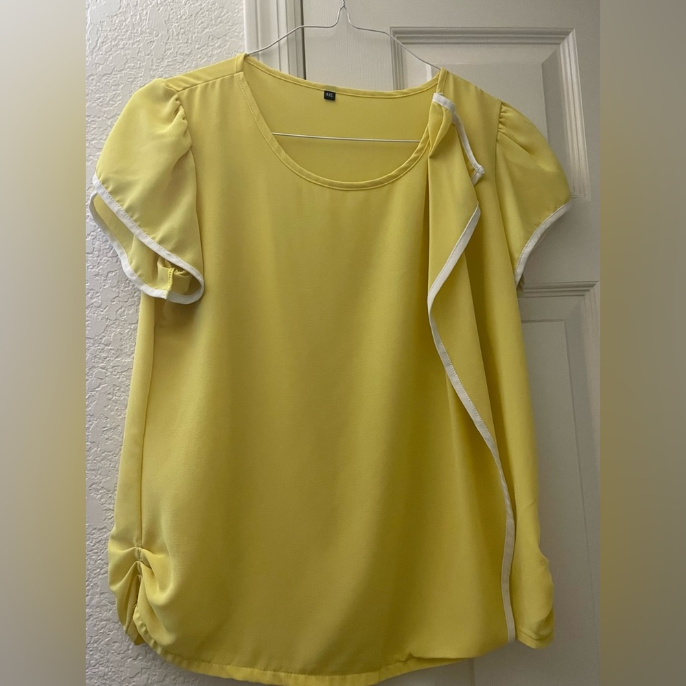 Yellow top with ruffle detail